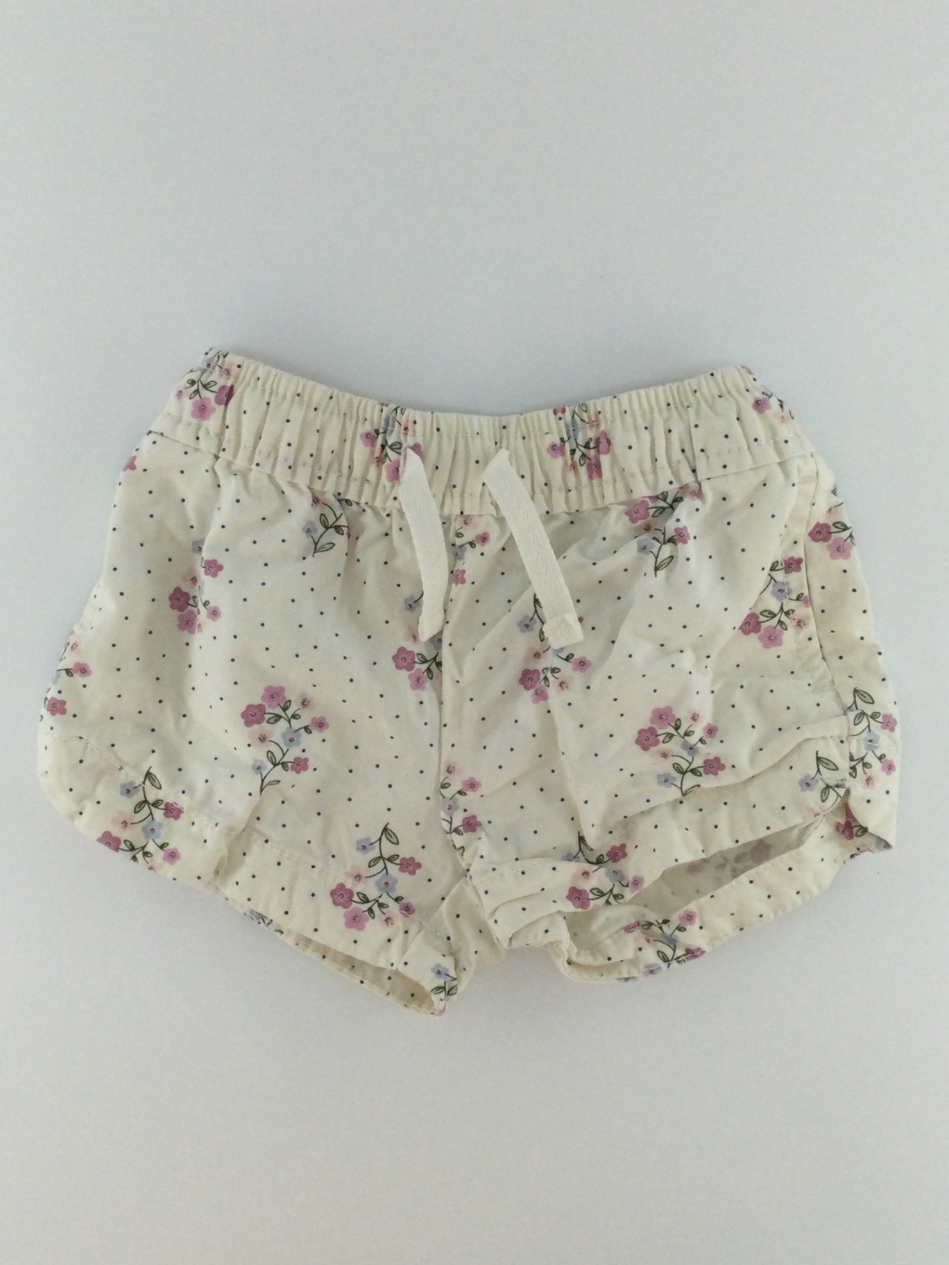Carter’s Baby Shorts 9-12m Cream w/ floral pattern