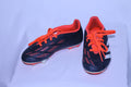 1K Predator Cleats - Black and Orange